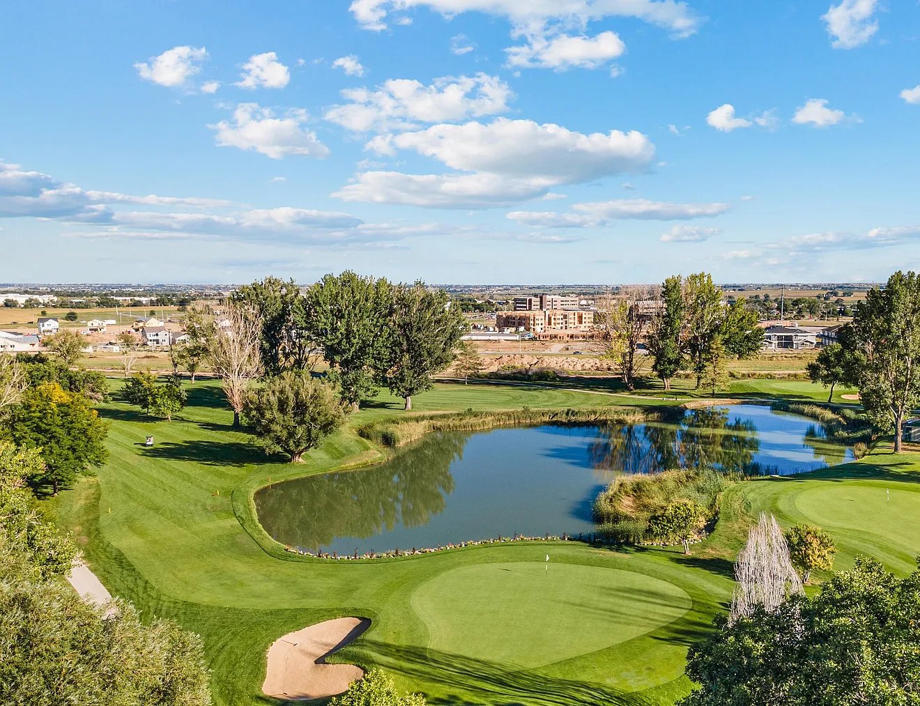 Golf course pond and greens from above